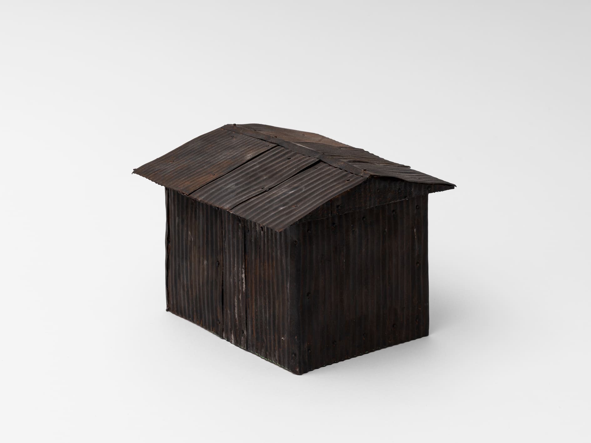 Naves, 2025, iron and wood, 28 x 18 x 15 cm